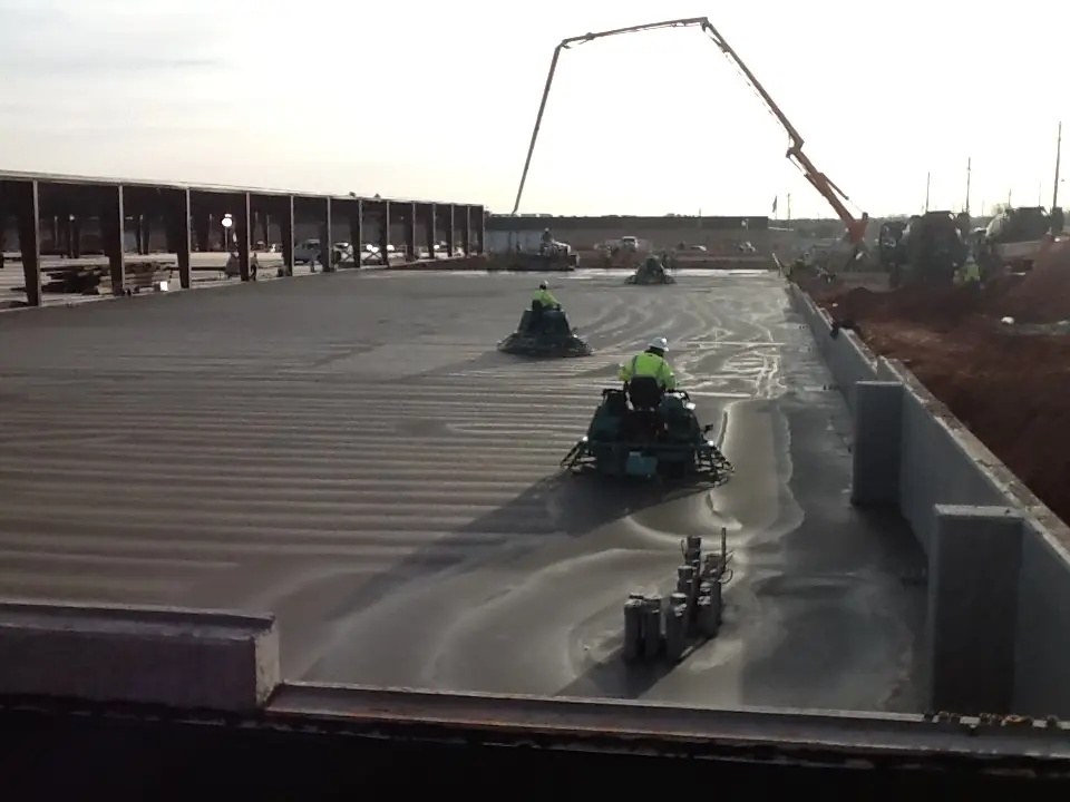 CEI operators finishing a commercial slab